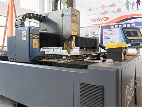 Laser cutting machine at SLHER factory for custom metal parts manufacturing