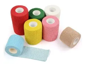 Self-adhesive cohesive bandage for veterinary and sports use